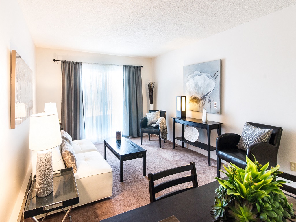 a living room with a couch and a table